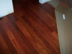 5" prefinished santos mahogany installation job site