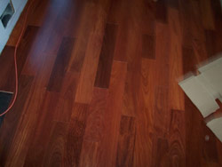 5" prefinished santos mahogany installation job site