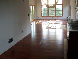 5" prefinished santos mahogany installation job site