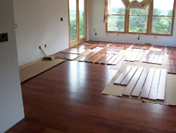 5" prefinished santos mahogany installation job site